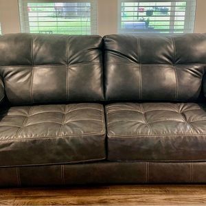 Couch and loveseat excellent condition. $1800 obo